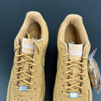 Pair of yellow Air Force 1 sneakers showing cushioned tongues and lace-up collar