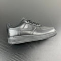 FRGMT Air Force 1 low-top sneaker, metallic silver with swoosh and lace-up eyelets