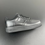 FRGMT Air Force 1 low-top sneaker, metallic silver with swoosh and lace-up eyelets
