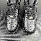 FRGMT Air Force 1 sneaker pair, dark uppers with silver toe caps and lace stays