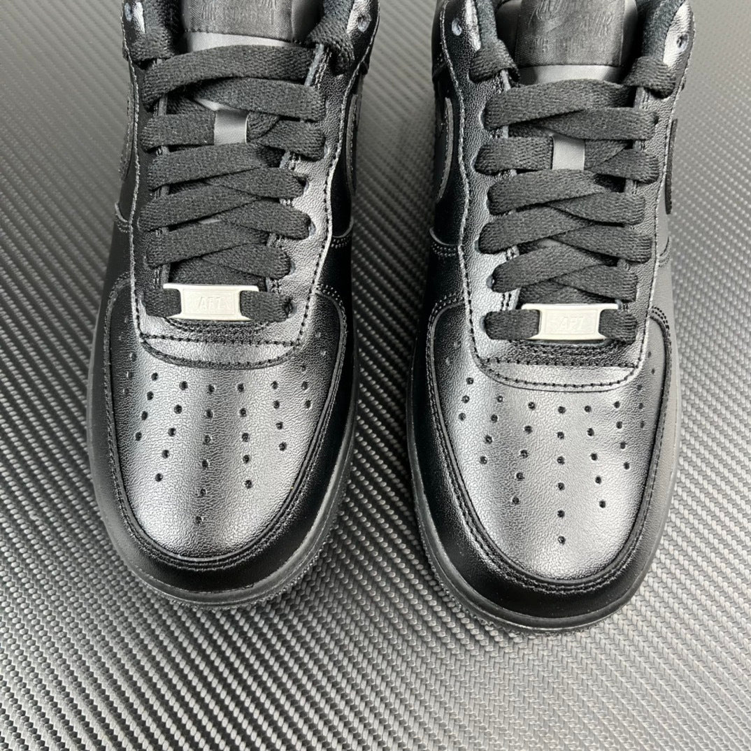 FRGMT Air Force 1 sneaker pair, dark uppers with silver toe caps and lace stays