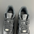 FRGMT Air Force 1 sneaker pair, dark uppers with silver toe caps and lace bars