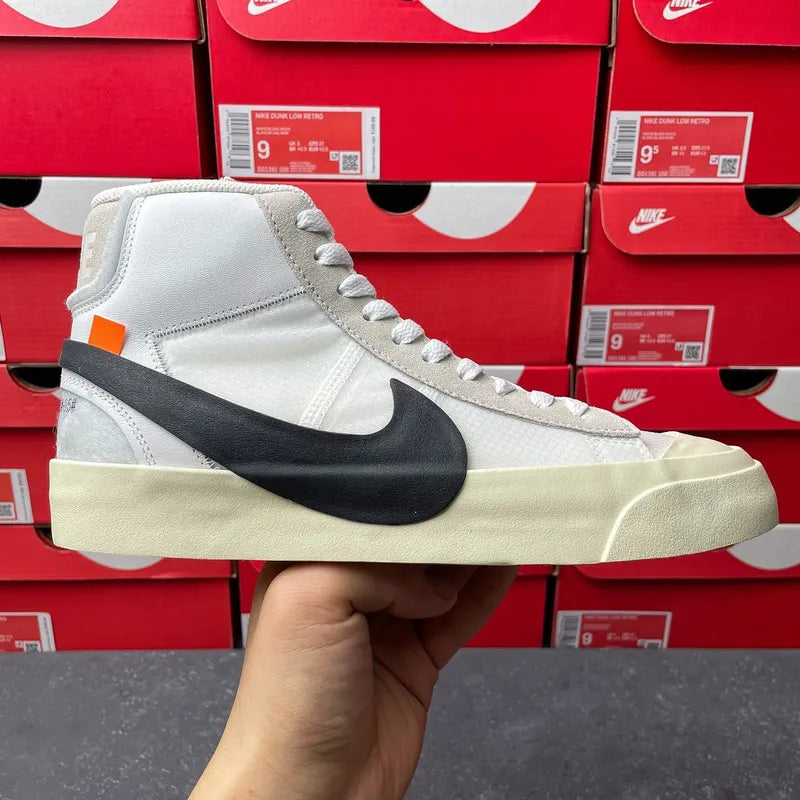 Off-white high-top sneakers with black swoosh and beige textured midsole