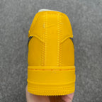 Yellow Air Force 1 sneaker heel and back panel with embossed seams