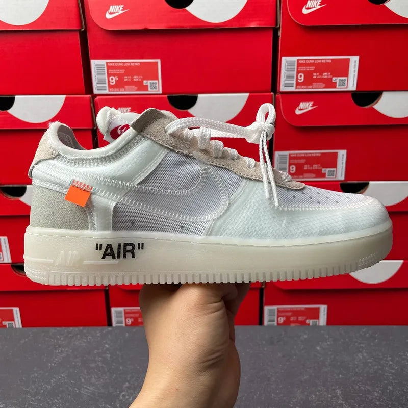 Off-white lace-up sneaker with Nike swoosh and 'AIR' midsole text