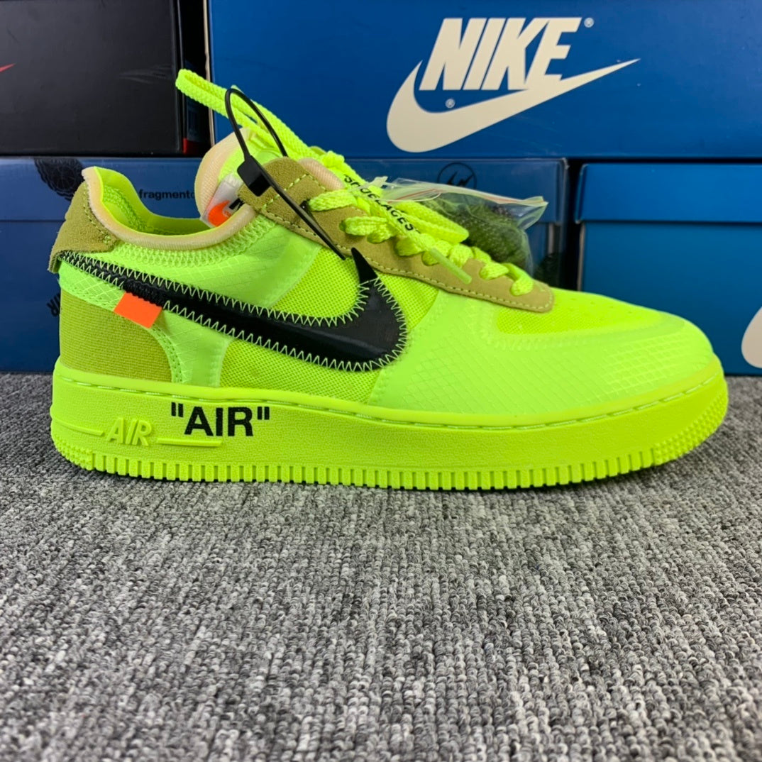 Neon green low-top sneaker with Nike swoosh and 'AIR' on the midsole