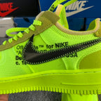 Neon green sneaker upper with 'for NIKE' text detail and stitched trim