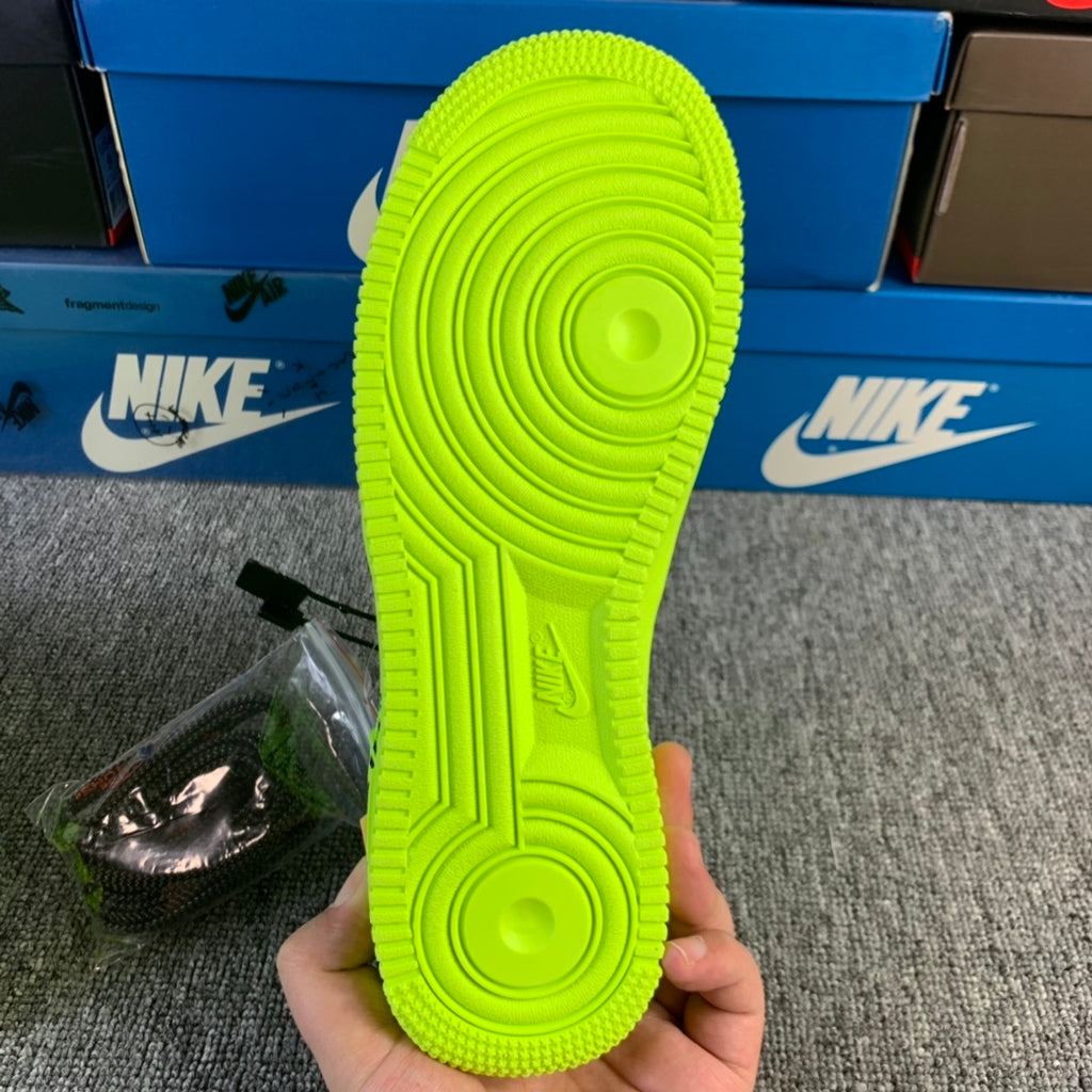 Neon green sneaker outsole tread with circular traction pattern