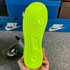 Neon green sneaker outsole tread with circular traction pattern