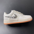 Low-top sneakers in sail canvas with chrome swoosh and orange gum sole