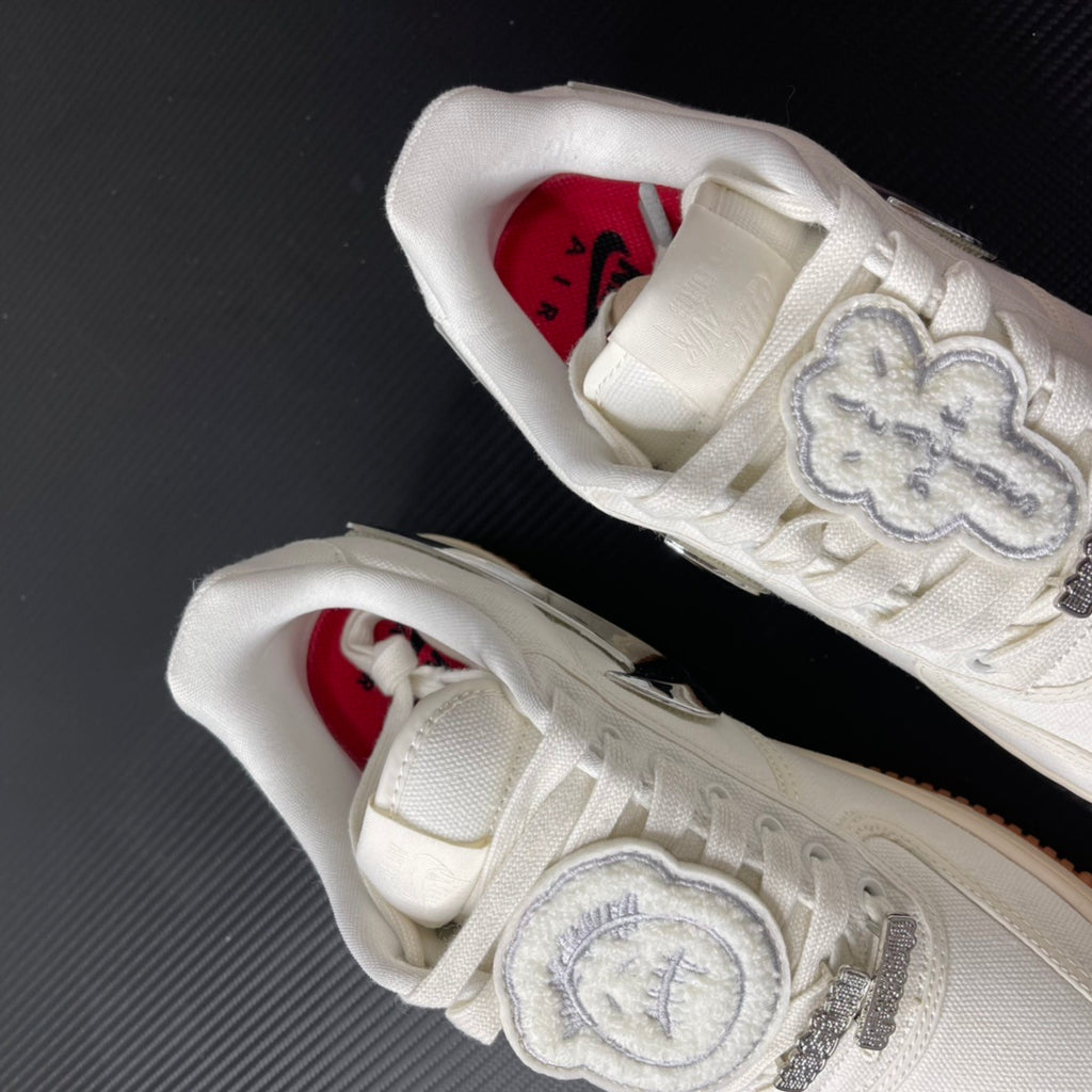 Low-top sneakers showing sail interior with red sockliner and logo insoles