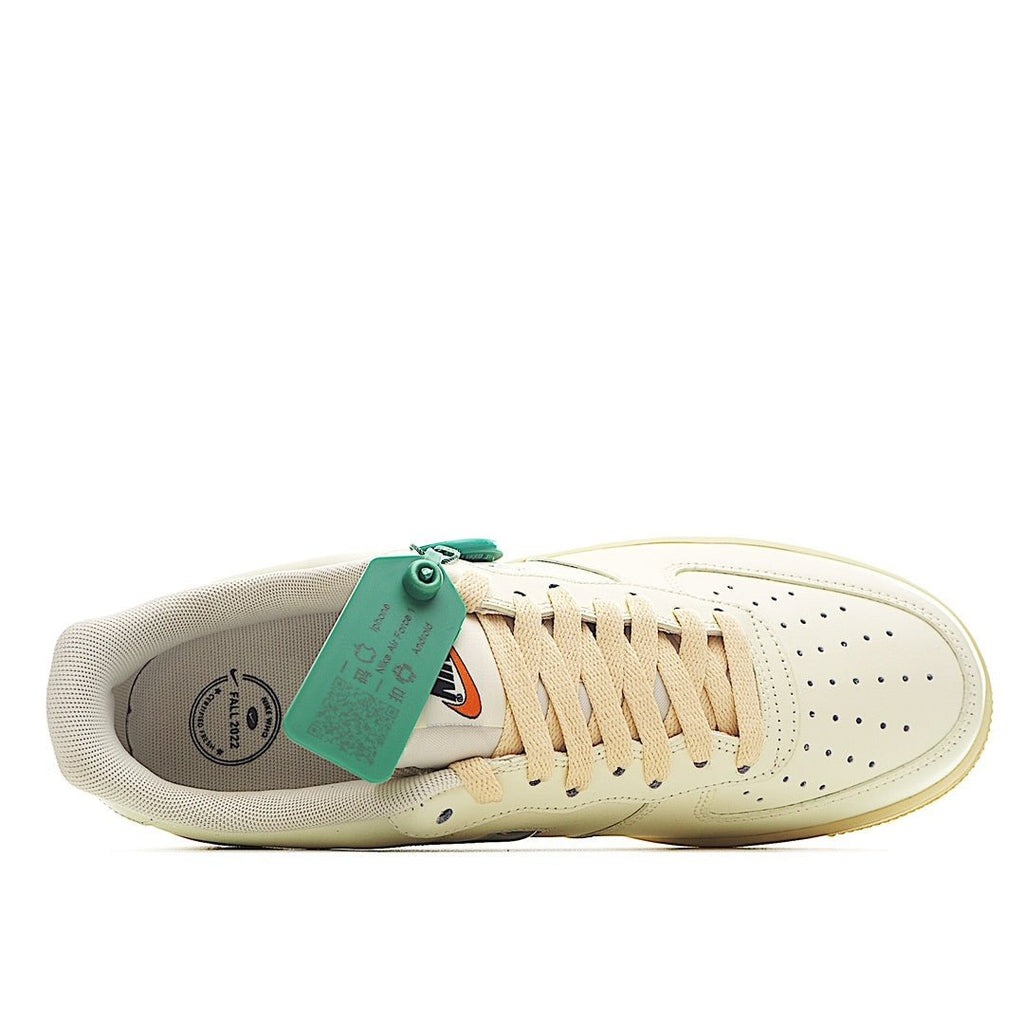 Nike Air Force 1 sneaker interior showing cream upper, laces, and green tag