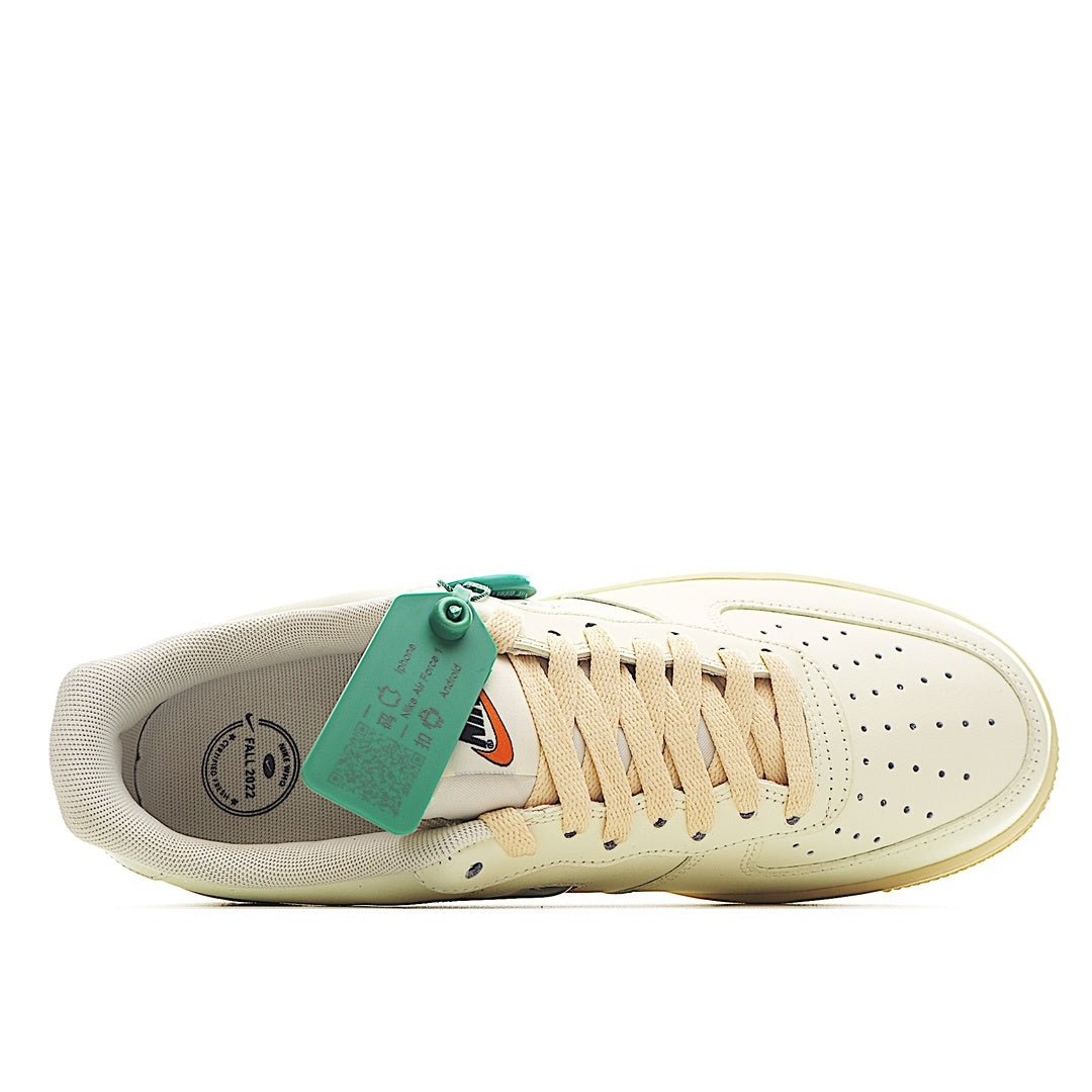 Nike Air Force 1 sneaker interior showing cream upper, laces, and green tag