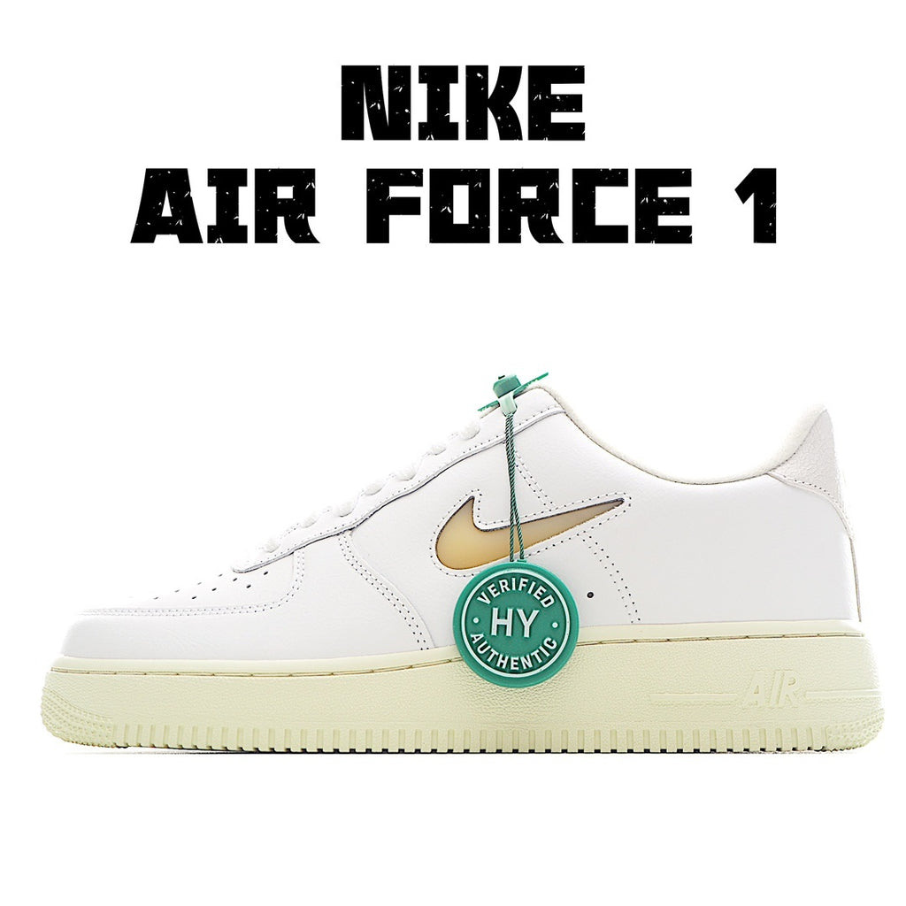 White leather low-top sneaker with gold swoosh and green HY authenticity tag
