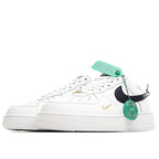 White leather sneaker with black Swoosh, gold accent, and green HY authenticity tag