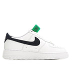 White leather sneaker with black Swoosh detail and green HY authenticity tag