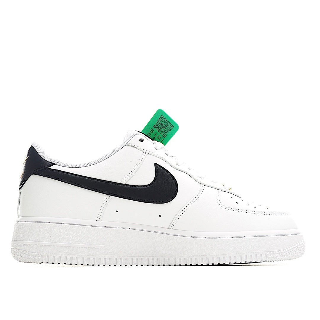 White leather sneaker with black Swoosh detail and green HY authenticity tag