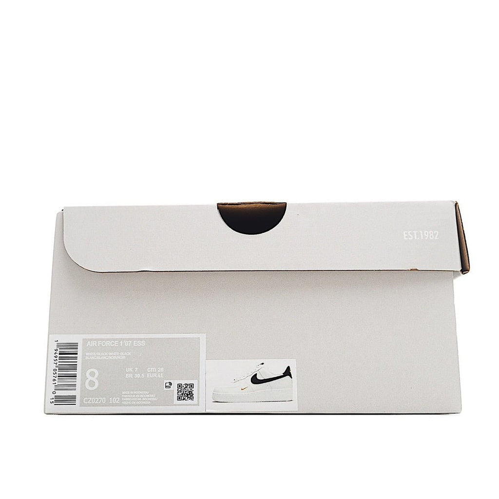 Nike shoe box with size label and swoosh logo on white cardboard