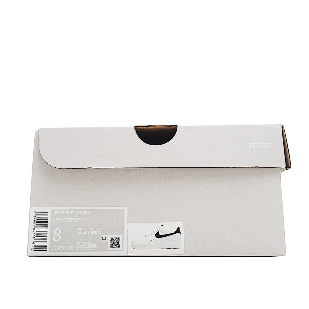 Nike shoe box with size label and swoosh logo on white cardboard