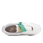Nike Air Force 1 sneaker, white with beige accents; Nike Air in lining and green tag