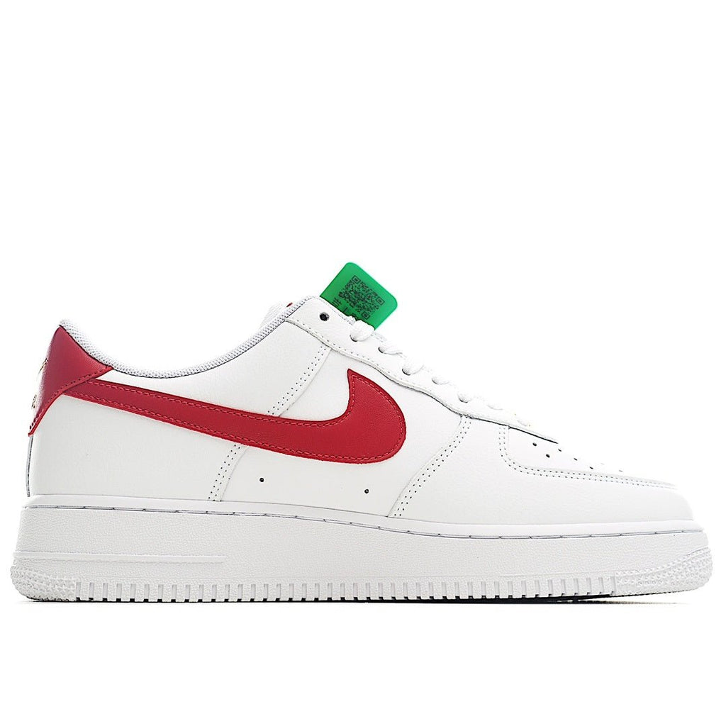 Nike Air Force 1 sneakers, white leather with red swoosh and white laces