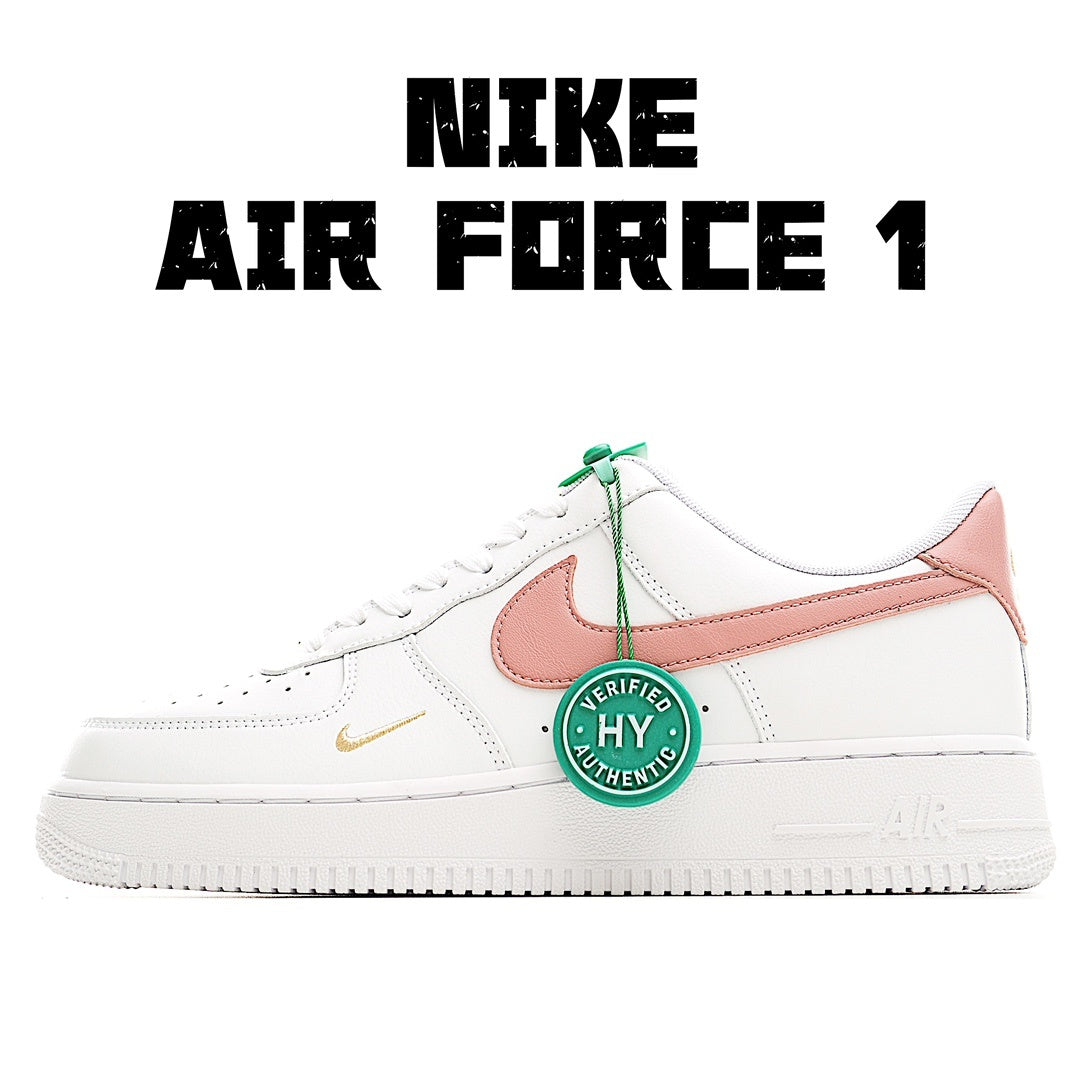 Nike Air Force 1 low-top sneakers, white with pink swoosh panel and green lace tag