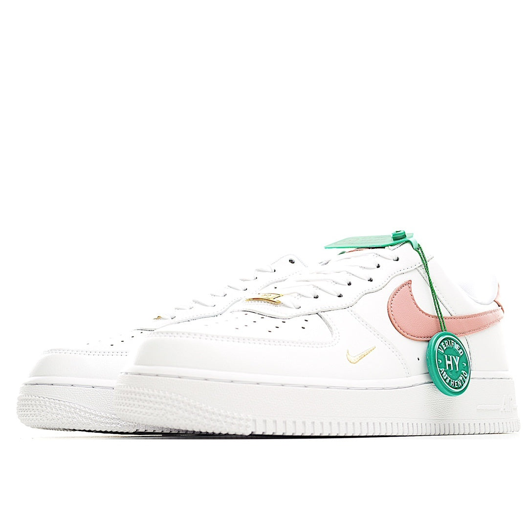 Nike Air Force 1 low-top sneakers side view, white with pink heel and gold swoosh