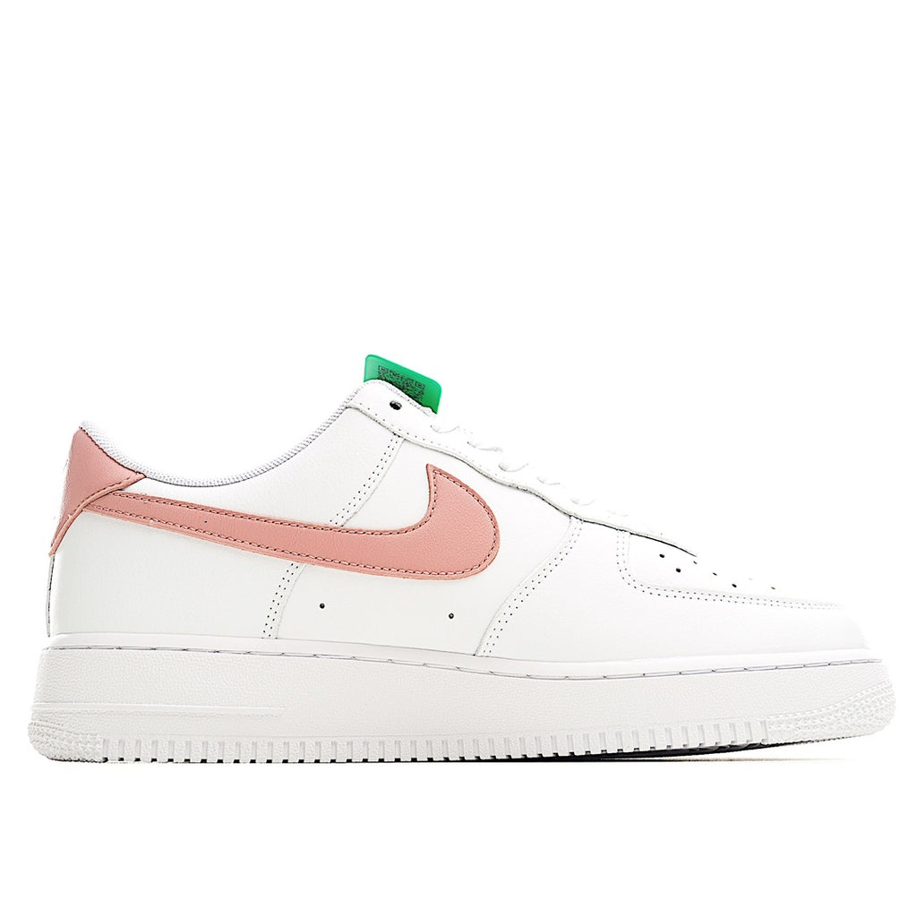 Nike Air Force 1 low-top sneakers, white leather with pink swoosh and green lace tab