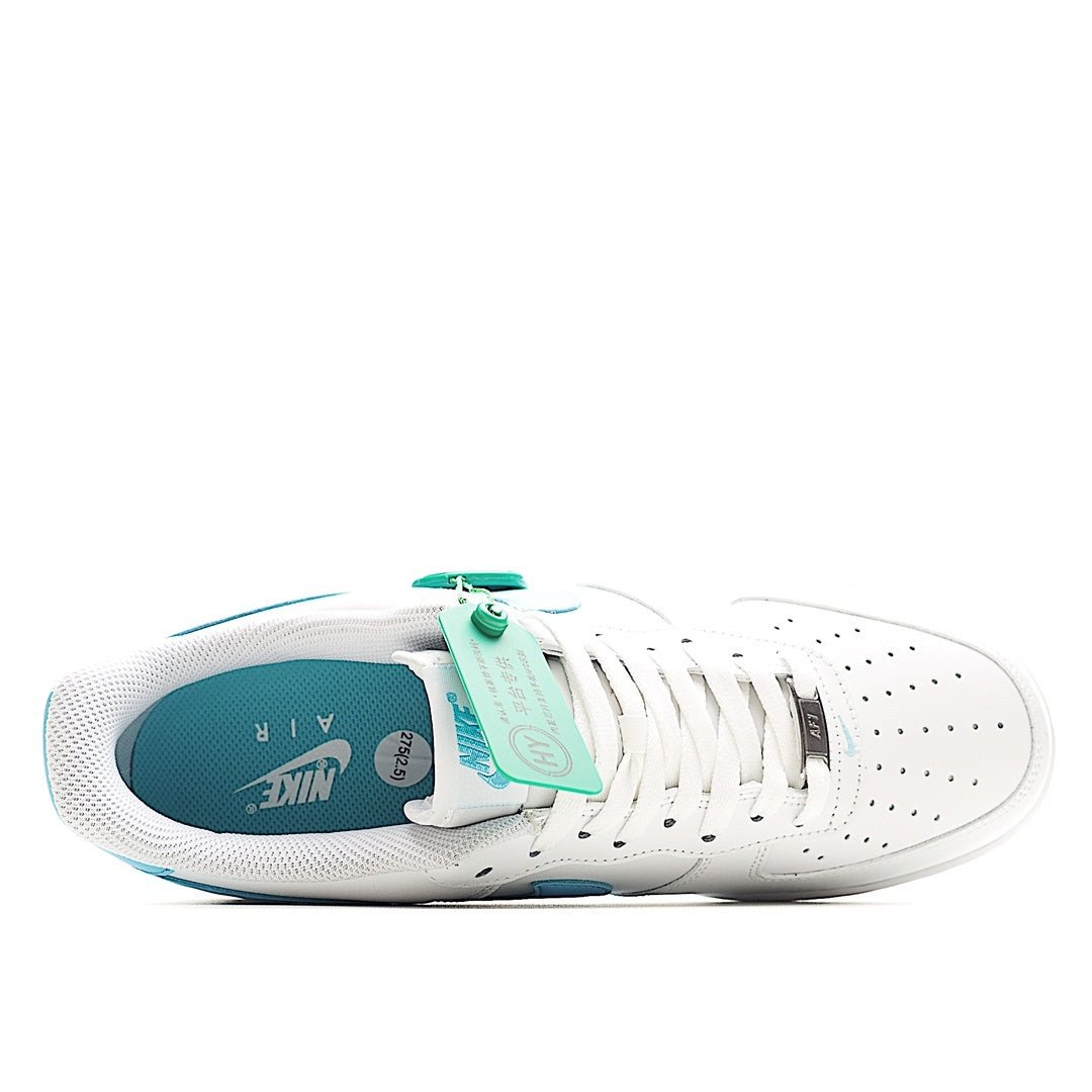White sneaker with light-blue interior lining, blue midsole, and lace-up closure