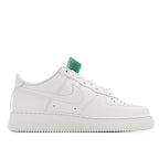 Nike Air Force 1 sneakers, white leather side profile with green hang tag