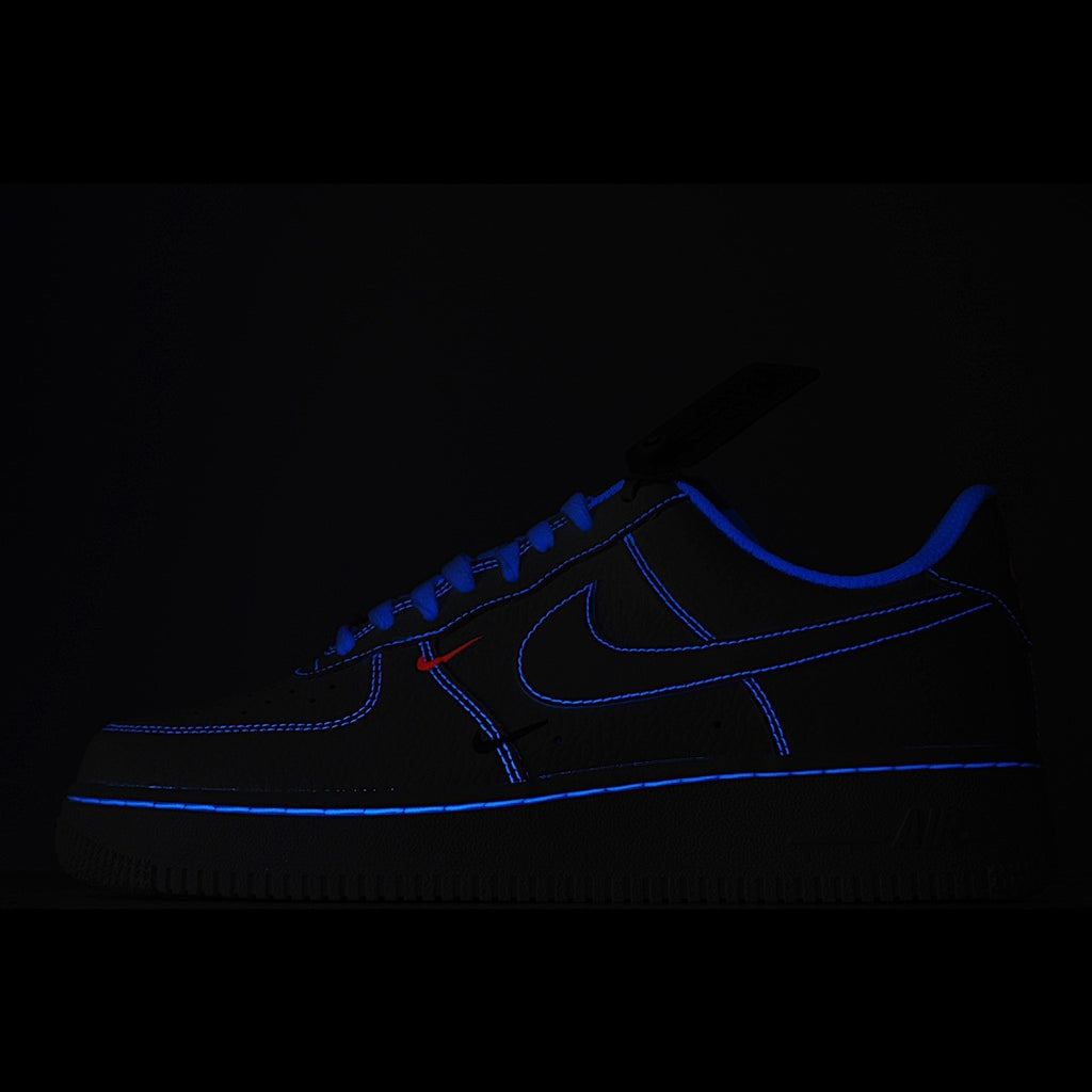 Nike Air Force 1 sneakers, dark blue leather with blue swoosh and black trim