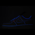 Nike Air Force 1 sneakers, dark blue leather with blue swoosh and black trim