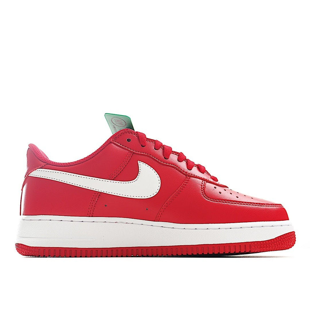 Red low-top sneakers with white swoosh and laces, green hang tag on tongue
