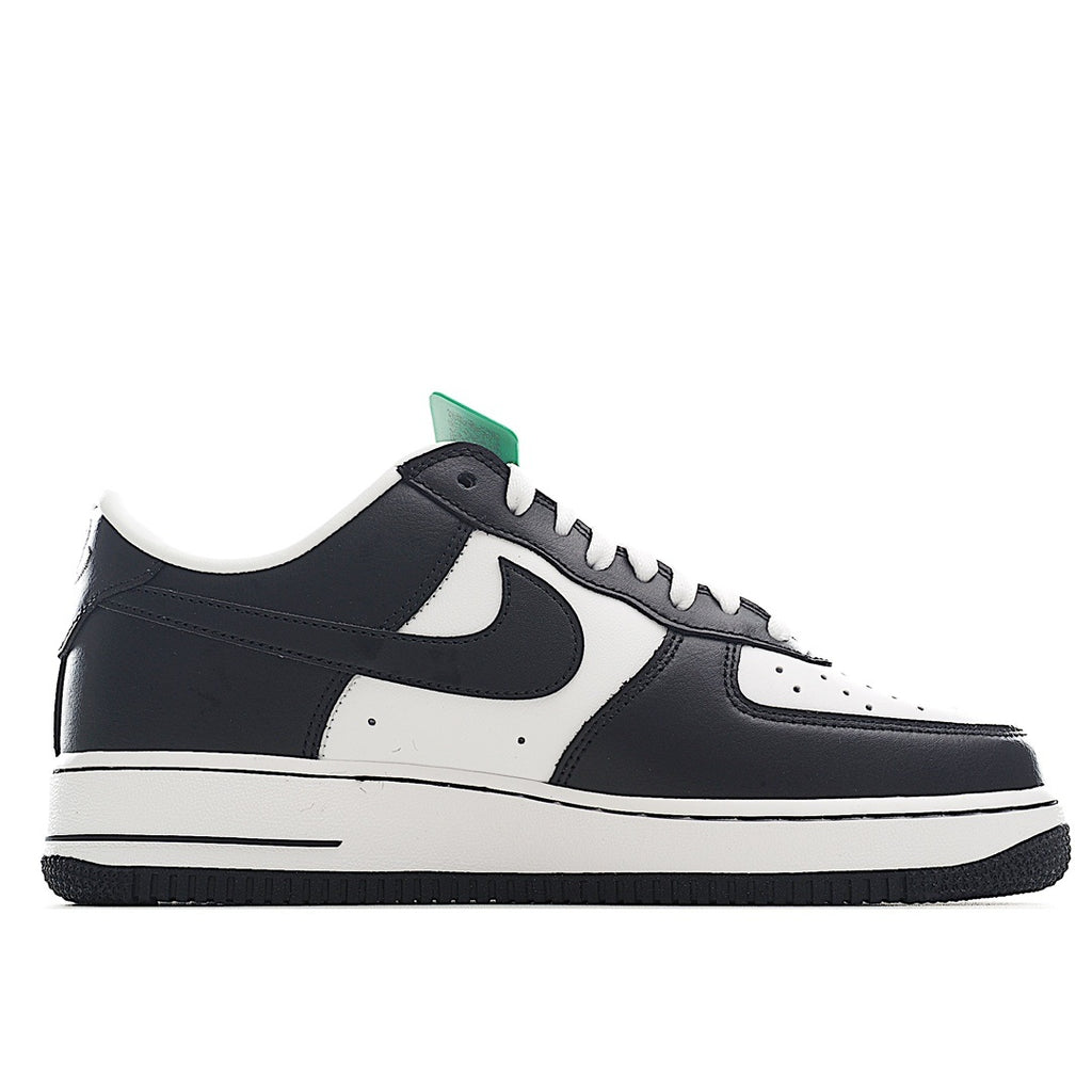 Black-and-white Nike Air Force 1 sneakers with green hang tag, low-top lace-up