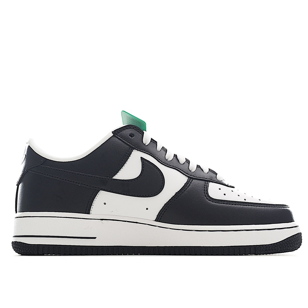 Black-and-white Nike Air Force 1 sneakers with green hang tag, low-top lace-up
