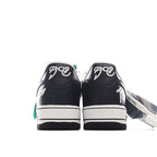 Black Nike Air Force 1 sneakers from the heel with green hang tag and white midsole