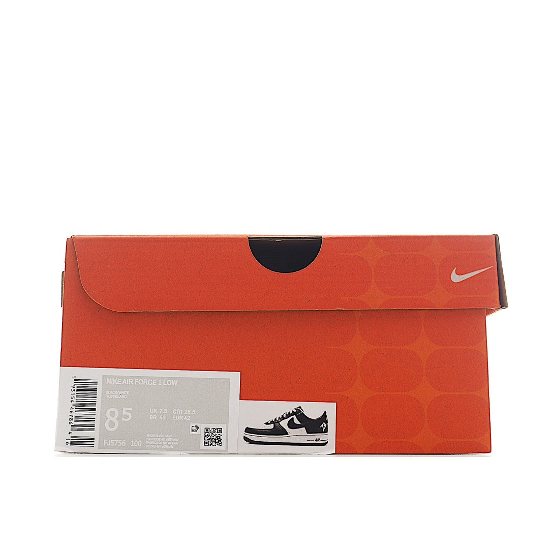 Orange Nike shoe box with white label and barcode