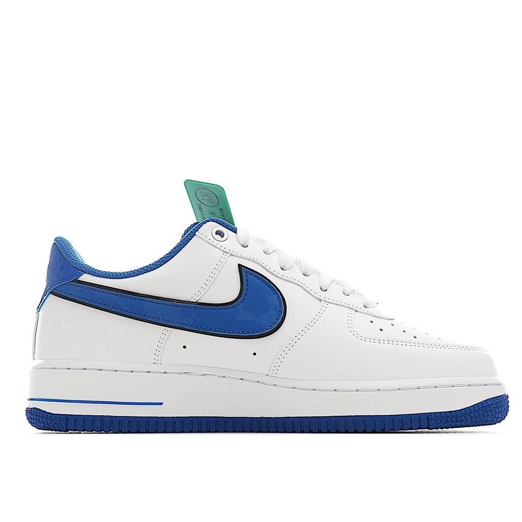 Nike Air Force 1 low-top sneakers in white with blue swoosh and blue collar accents