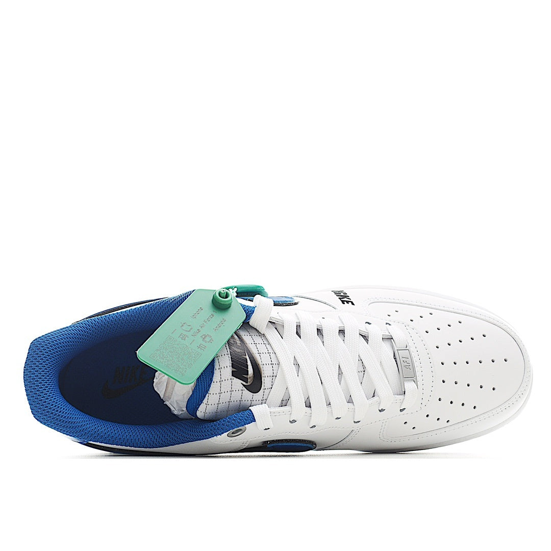 Nike Air Force 1 low-top sneakers, white leather look with blue lining and green tag