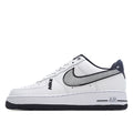 White Air Force 1-style low-top sneaker with black Swoosh and navy accents.