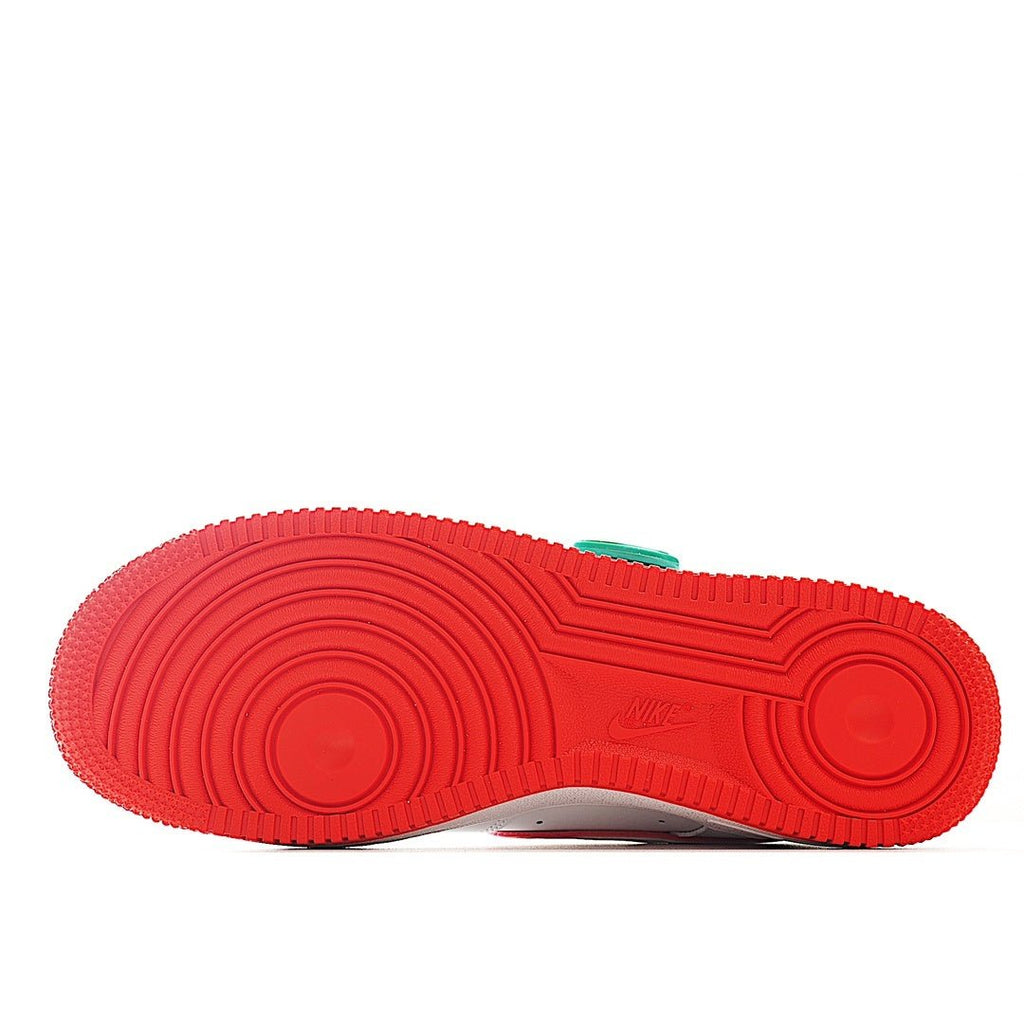 Red Air Force 1 outsole tread view with circular traction pattern