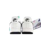 Back view of white Air Force 1 low-top sneakers with Nike Air heel tabs