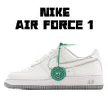 Nike Air Force 1 sneakers, white leather with green lace tag and perforated toe
