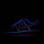Nike Air Force 1 sneakers, dark blue upper with bright blue outline lighting
