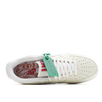 White Nike Air Force 1 sneakers, inside view of upper, green tag