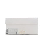 White sneaker shoe box with barcode label