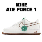 Nike Air Force 1 low-top sneakers, white leather with tan swoosh and brown sole