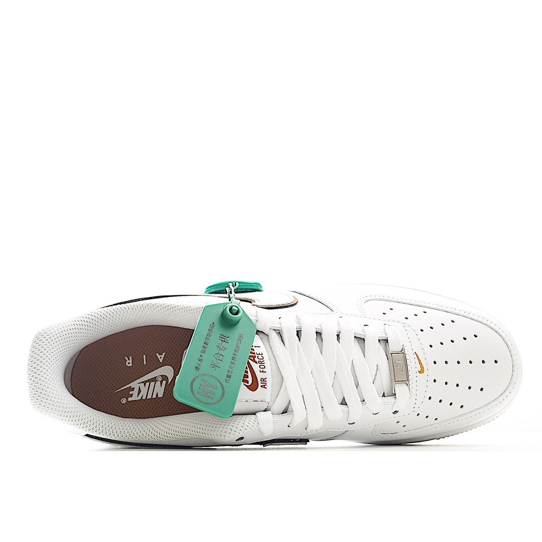 Nike Air Force 1 low-top sneakers, white leather with brown outsole and visible inner lining