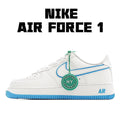 White low-top sneaker with blue swoosh, blue sole, green lace tag, lace-up.