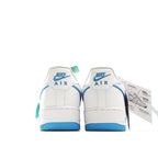 White sneakers back view with blue accents and green lace tags, plus hanging label.
